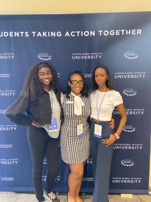 L-R Mayah Otunya, SGA Senator, Asia Webb, SGA President, and Mickline Iradukunda, SGA Senator and Peer Mentor